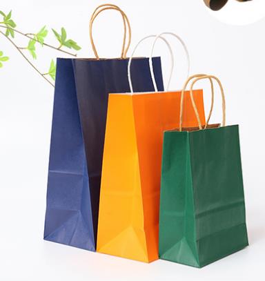 Grossistanpassad logotyp återvinningsbar brun shoppingpåse av kraftpapper med vridet platt handtag
